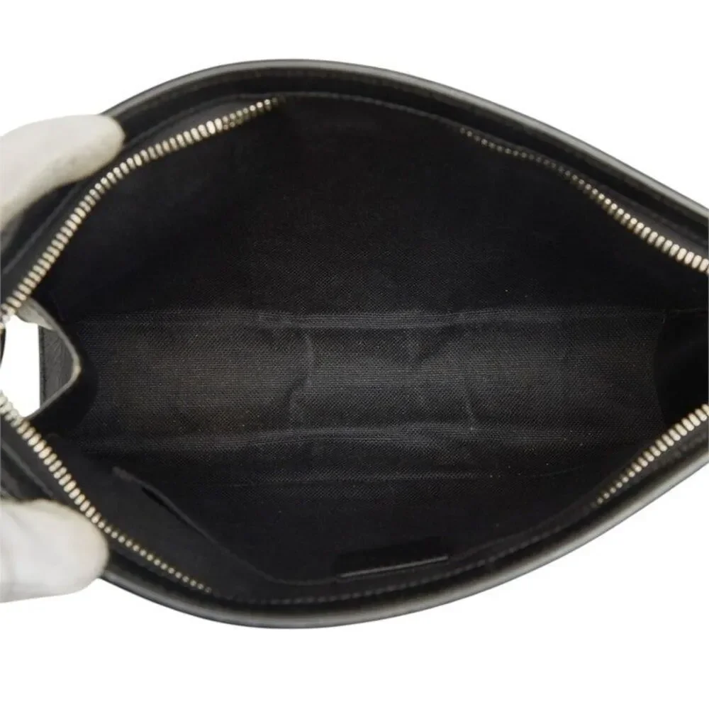 Gucci GG Supreme Clutch Bag